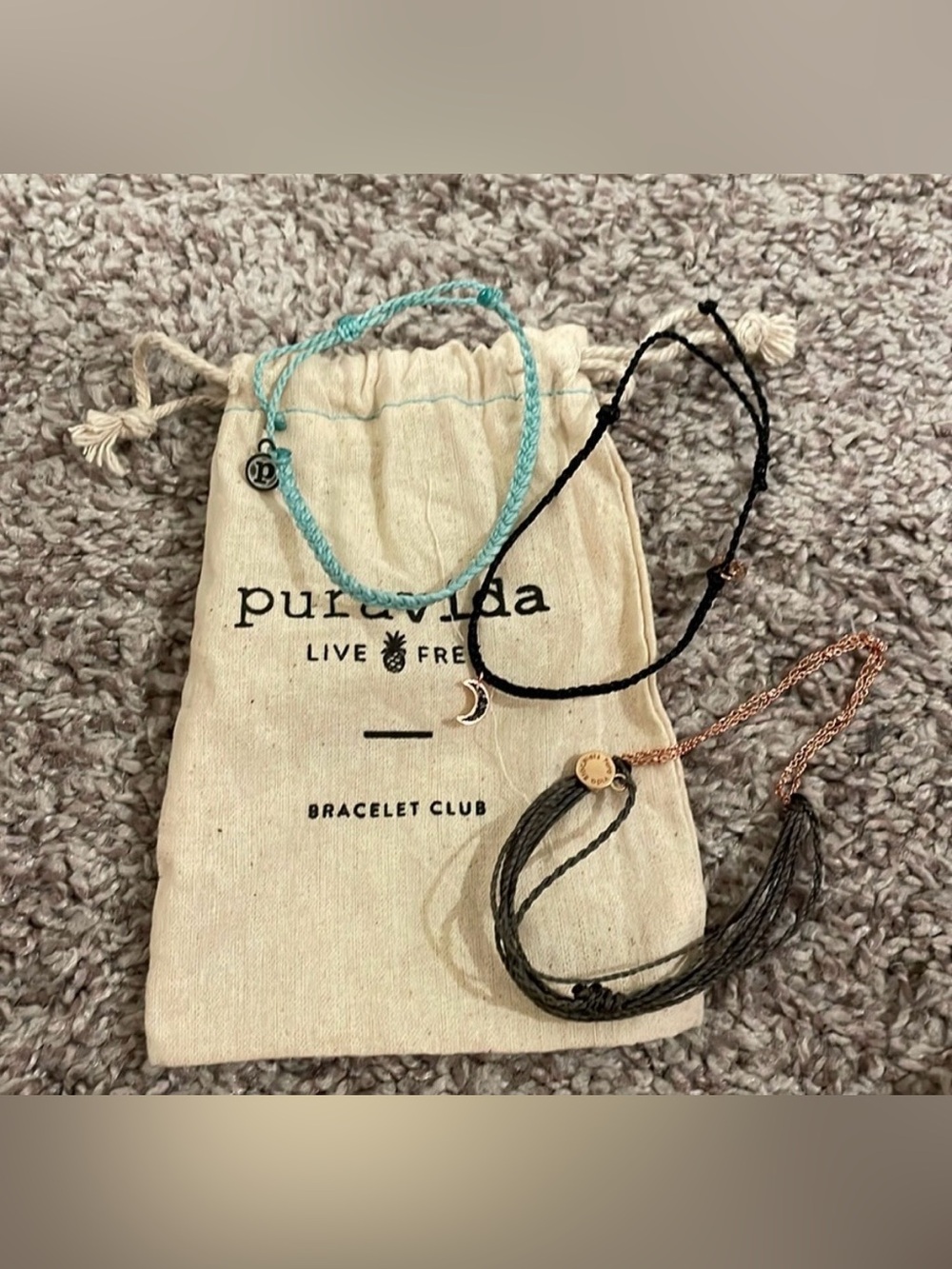 Pura Vida three bracelets with pouch